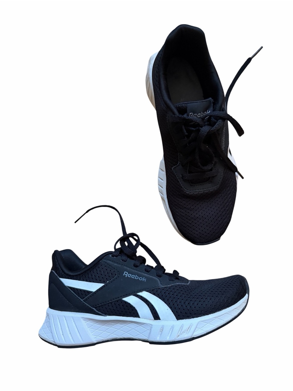 Reebok women’s Black and White Running Shoes
